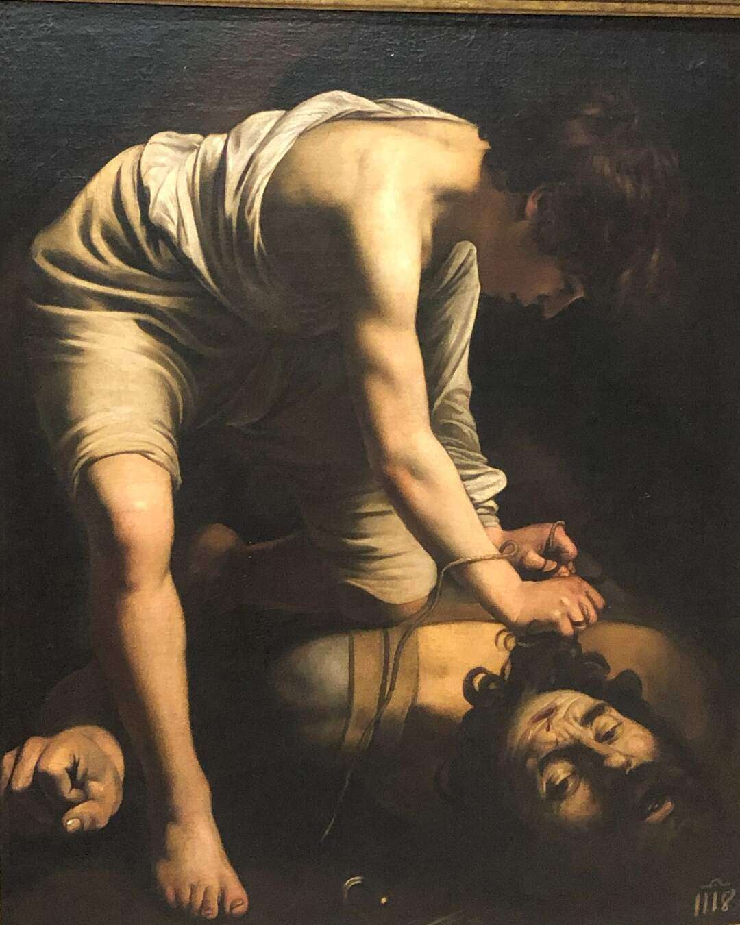 Famous Painting in the Prado Museum in Spain showing a young man kneeling over a headless bearded man